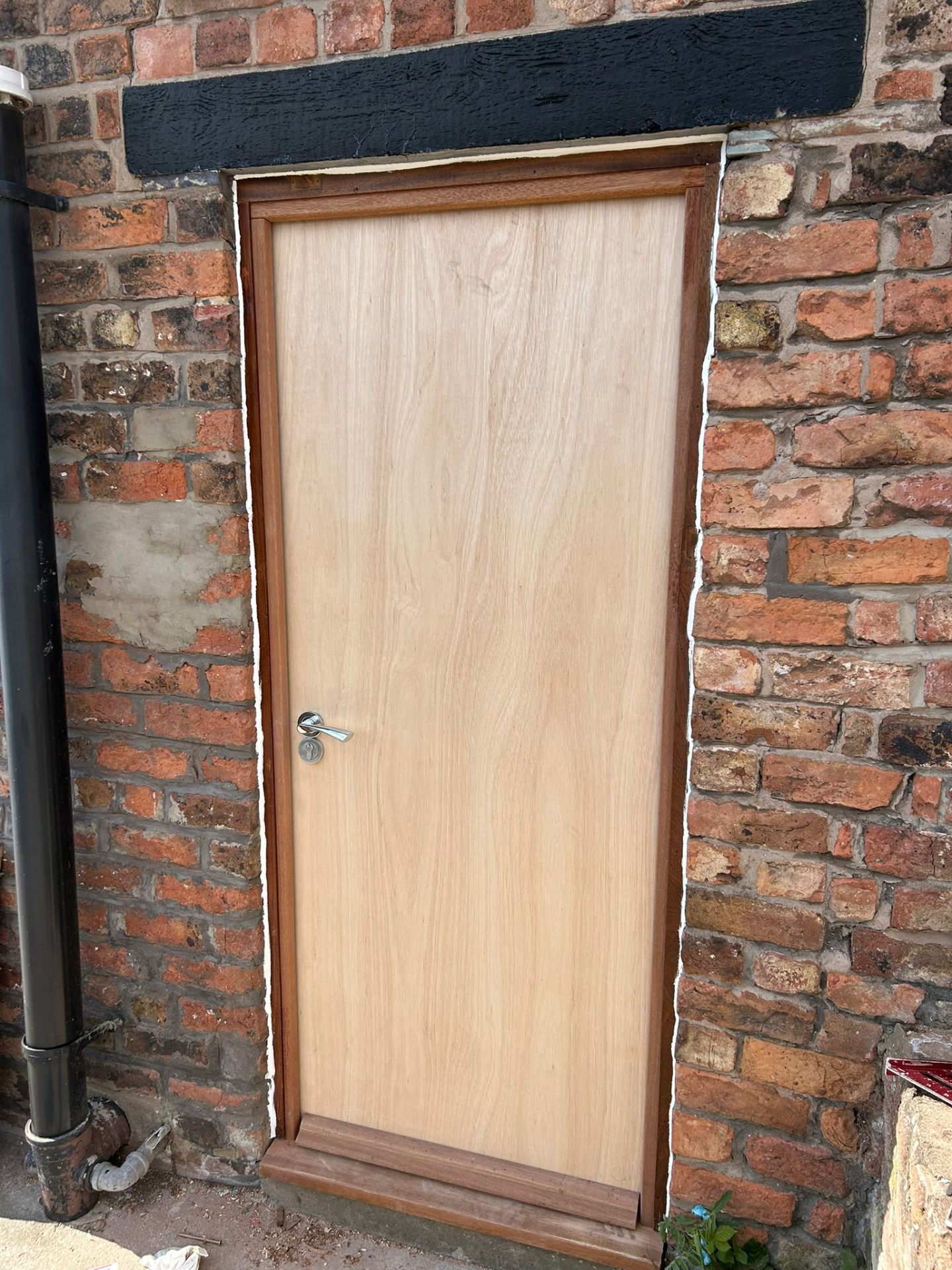 Compliant FireQual-certified fire door fitted in HMO by D2 Joinery